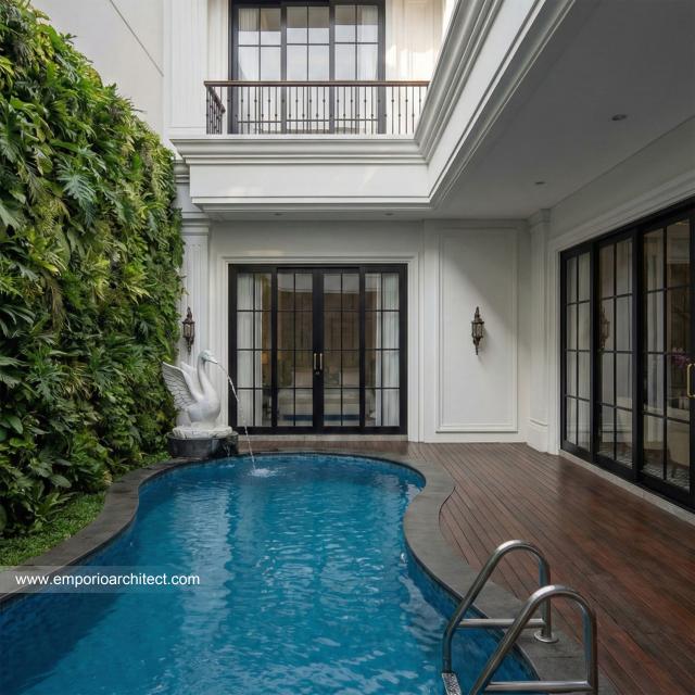 Desain Tampak Belakang Rumah Mediteran Klasik 2 Lantai Bapak SGK di Malang