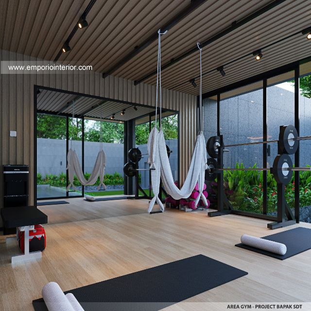 Desain Area Gym Rumah Modern 2 Lantai Bapak SDT II di Solo